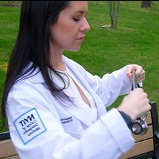 Student in white medical coat